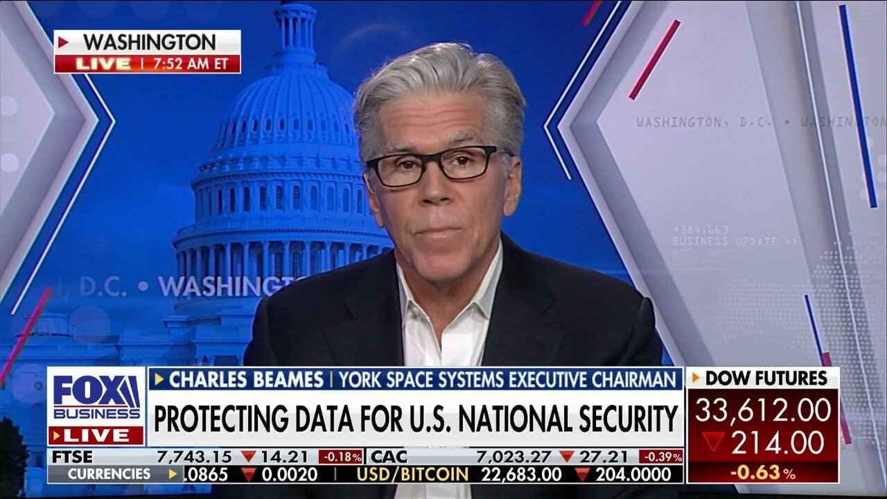 a man in glasses is on the news