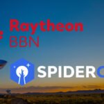 a radio dish with the words raytheon bbn and spider oak
